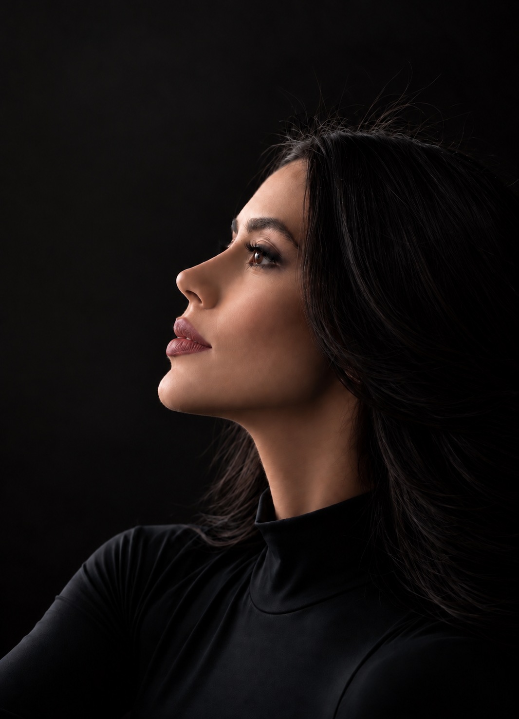 Retrato de perfil da Dra. Pâmela Nazario